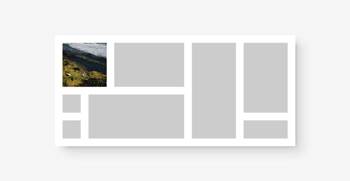 Rettangoli grigi con padding bianco, con uno dei rettangoli sostituito da un'immagine.