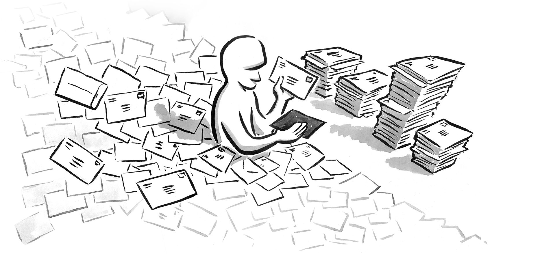 Person immersed in a pile of mail, which they are sorting by hand.