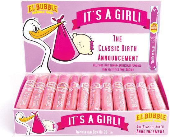 A box of 'It's a girl!' baby announcement candy cigars in pink